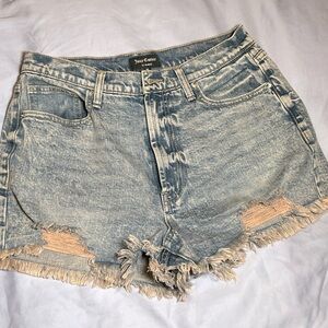 Juicy Couture Jean shorts with pink frayed cut off look